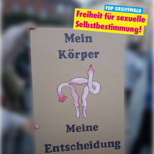 Foto mit einem Plakat