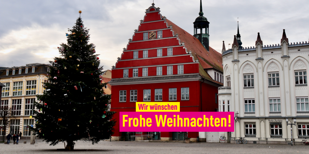 Motiv des Greifswalder Rathauses mit Weihnachtsbaum